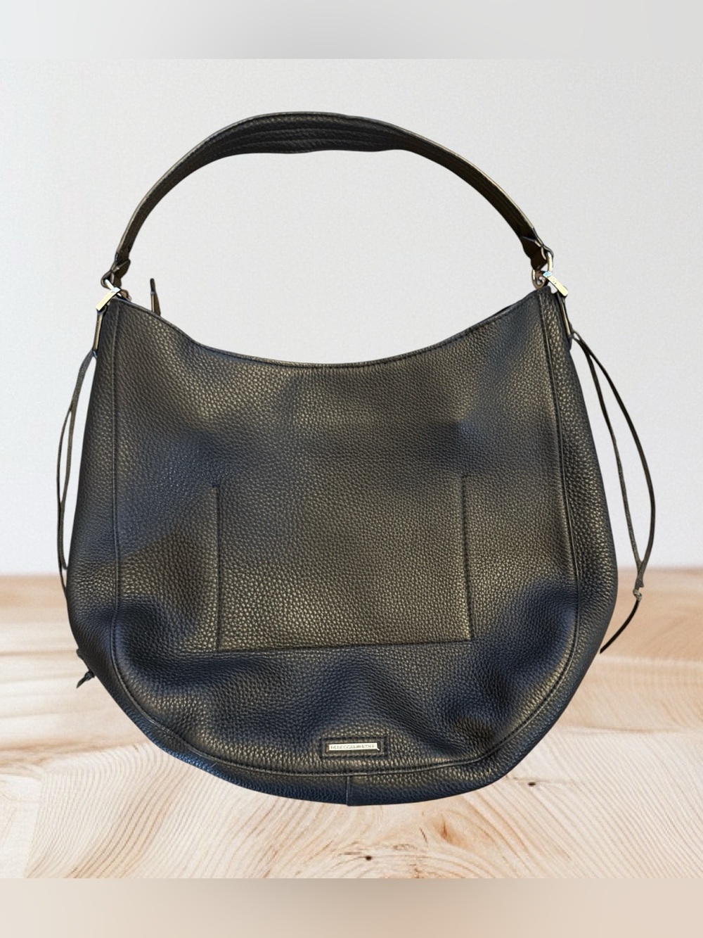 Rebecca Minkoff Unlined Convertible Hobo Bag in black pebbled leather.